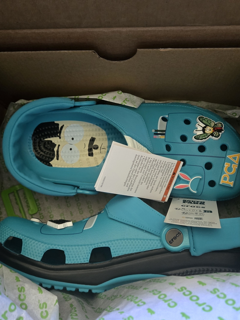 CROCS Southpark "Randy" in Turquoise with Charms